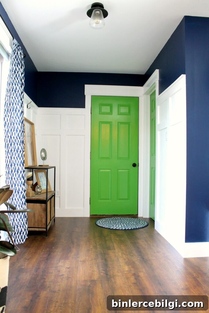Interior Door Paint Color Ideas to Transform Your Home 13 Mud room with navy walls, white trim, and bright green interior doors