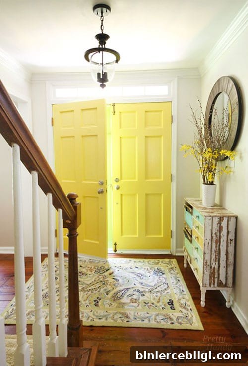 Interior Door Paint Color Ideas to Transform Your Home 6 Entryway with Highlighter Yellow painted door