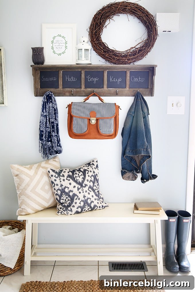15 Clever Entryway Storage Ideas for Small Spaces 8 Styled shelf with hooks and chalkboard labels.