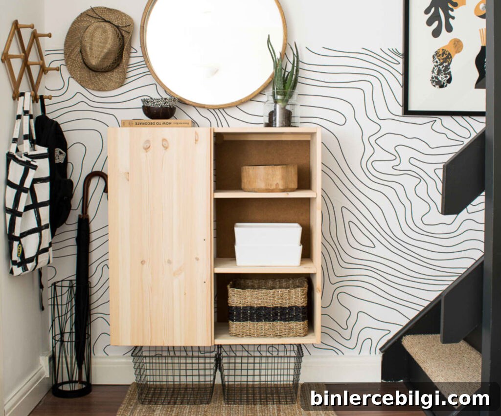 15 Clever Entryway Storage Ideas for Small Spaces 14 Wall-mounted cabinet and baskets create organized entryway storage.
