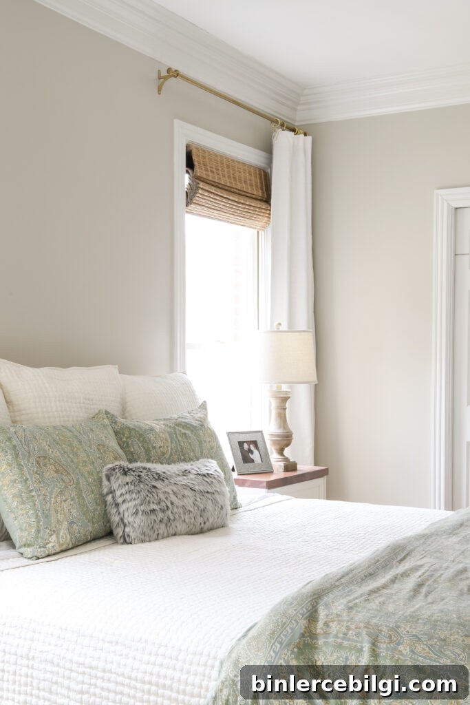 Bamboo Shades and Ivory Curtains in the Master Bedroom