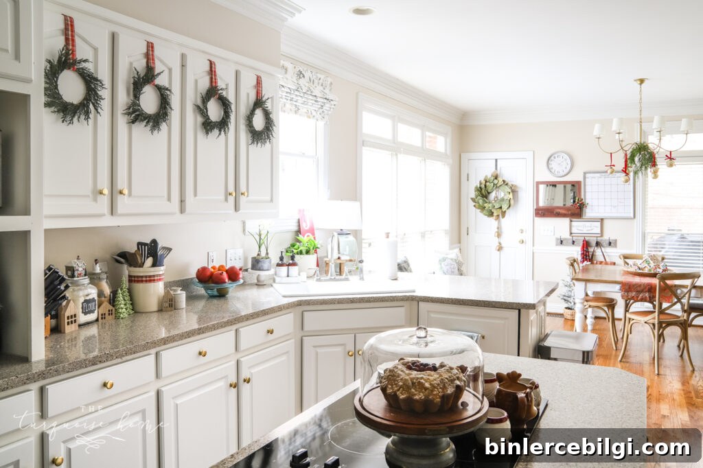 Christmas Wreaths on White Kitchen Cabinets