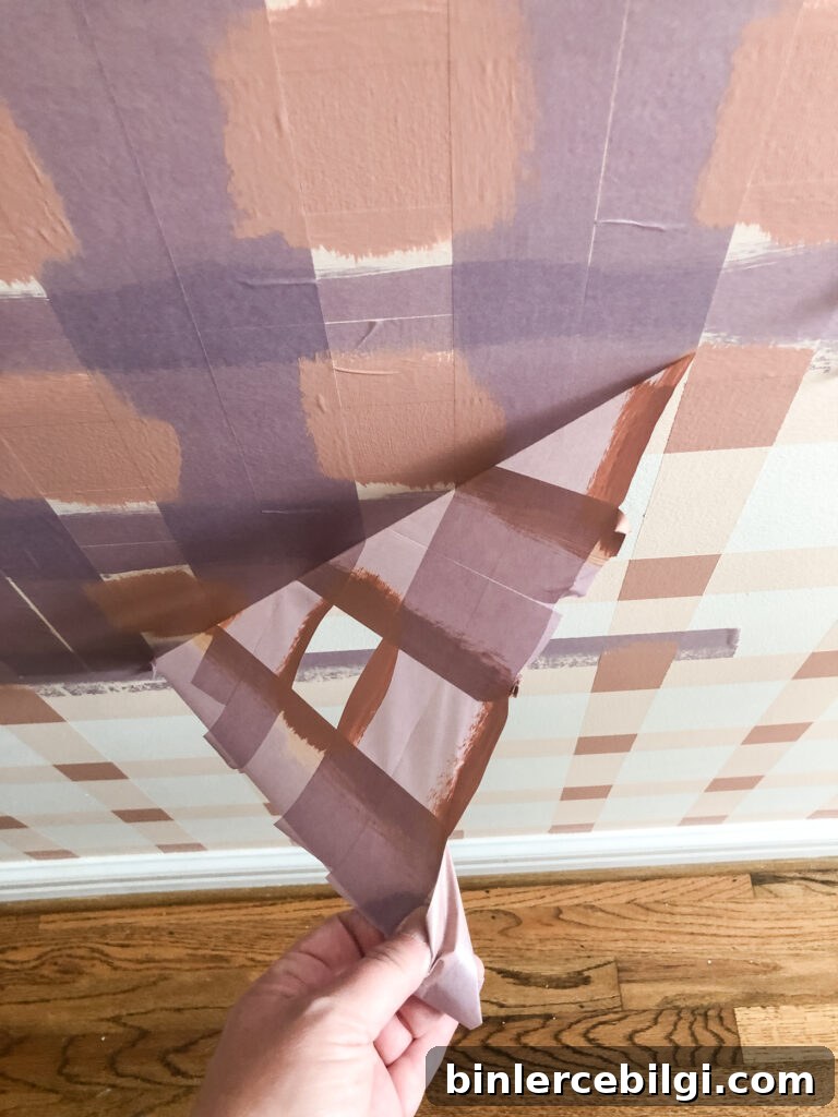 Remove tape on painted plaid wall