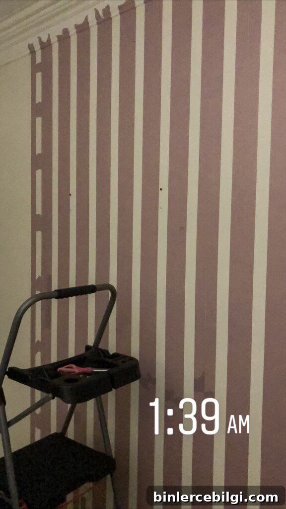 Tape lines for plaid painted wall