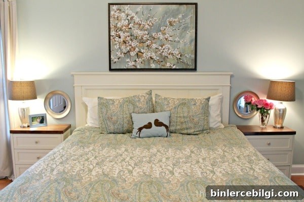 Master Bedroom with a Large Piece of Art over the Bed