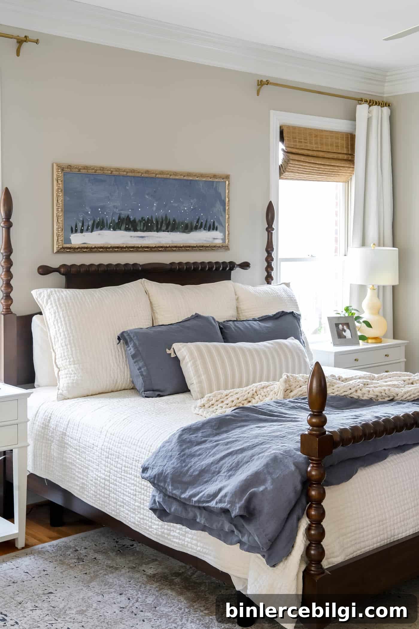 primary bedroom with winter art over the bed