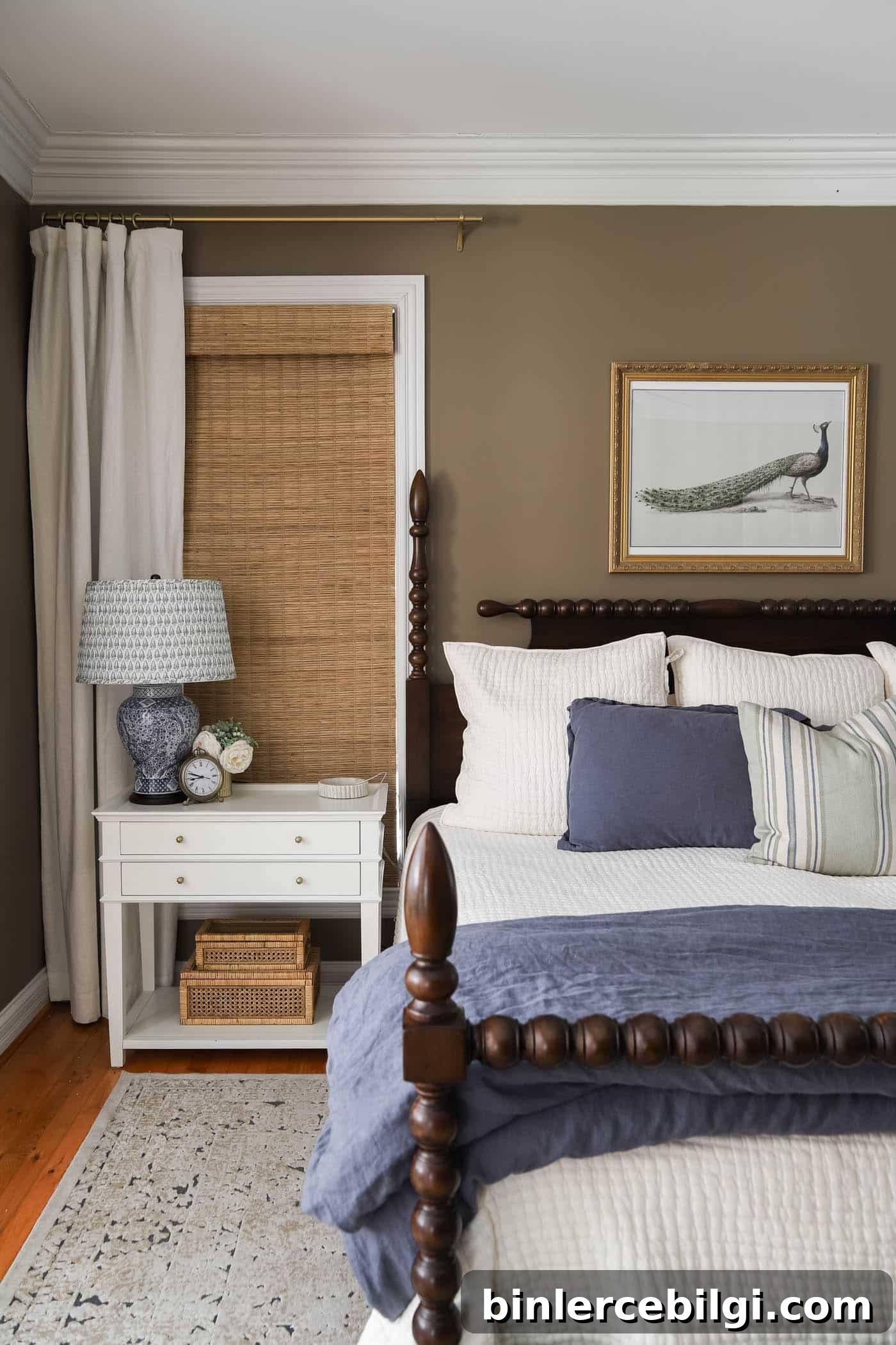 primary bedroom with white nightstands and chinoiserie lamps with pleated block print lamp shades.