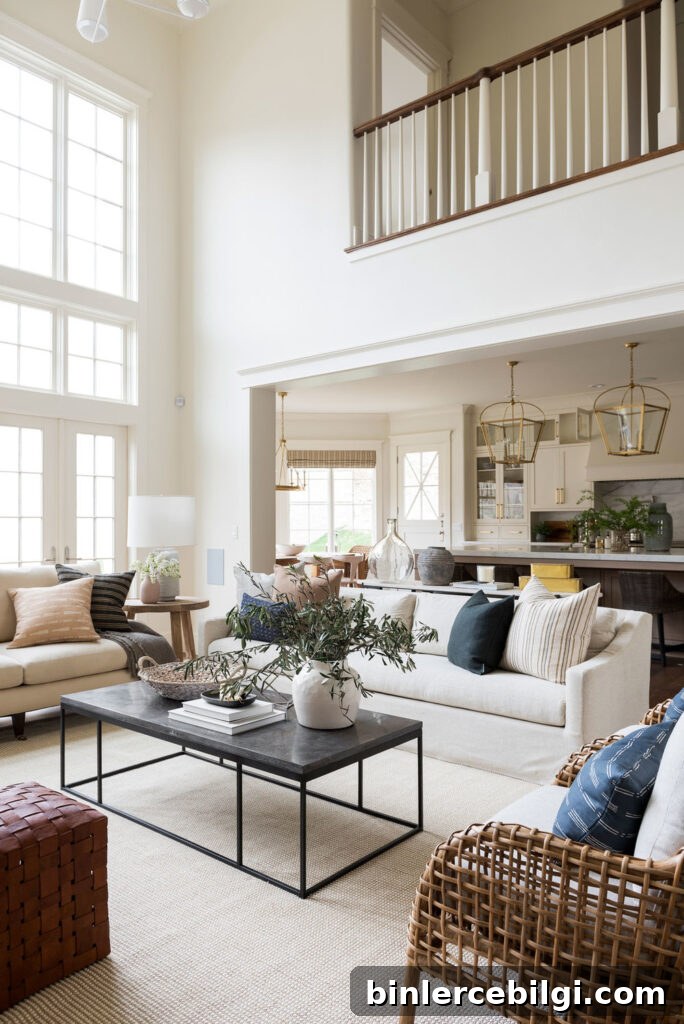 large airy living room painted in Swiss Coffee by Benjamin Moore