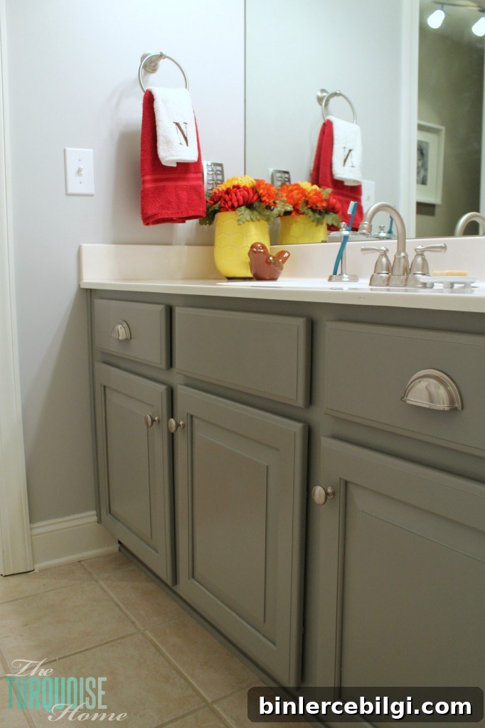 Traditional-Americana Guest Bathroom Update: painted walls, cabinets, new hardware and a punch of color!