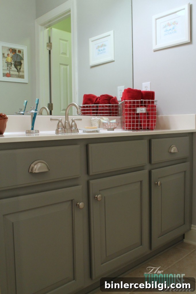 Traditional-Americana Guest Bathroom Update: painted walls, cabinets, new hardware and a punch of color!