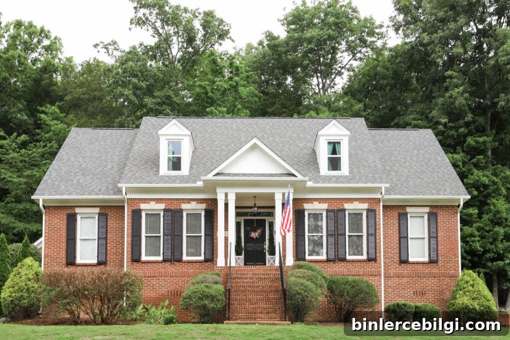 Red Brick House with White Trim and Black Shutters