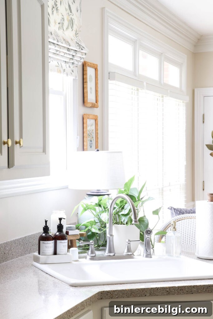White Sink, Marble Soap Tray and Lamp Behind Sink