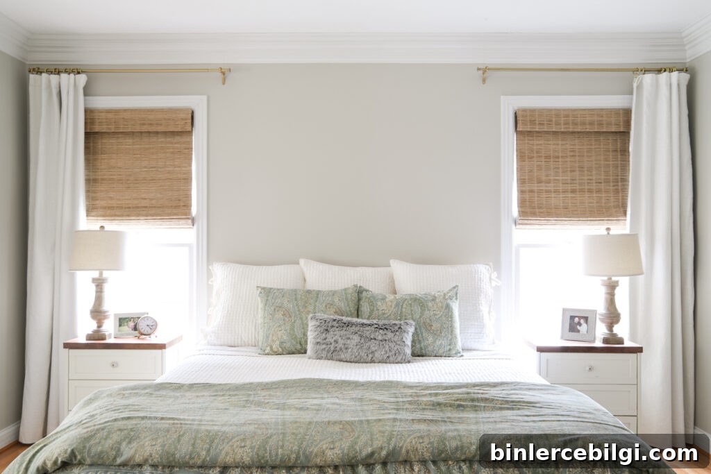 King size bed with bamboo shades and curtains