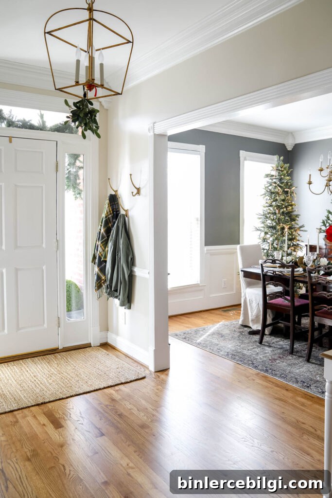 Gold and Greenery Christmas Dining Room Decor 9 Hanging Mistletoe in the Foyer