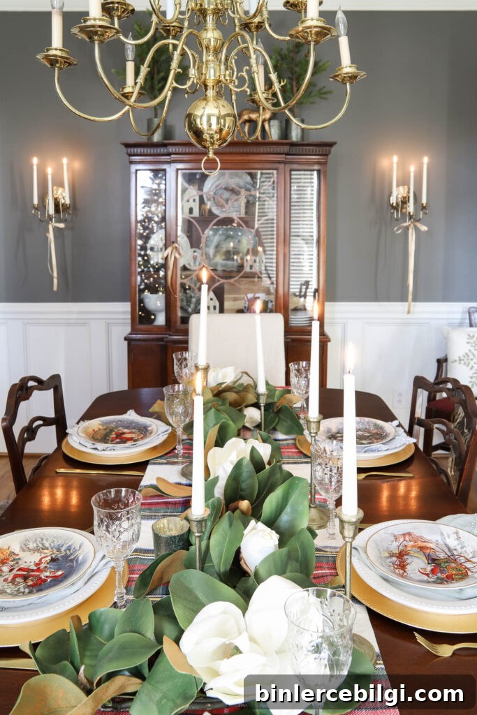 Gold and Greenery Christmas Dining Room Decor 4 Antique China cabinet decorated for Christmas