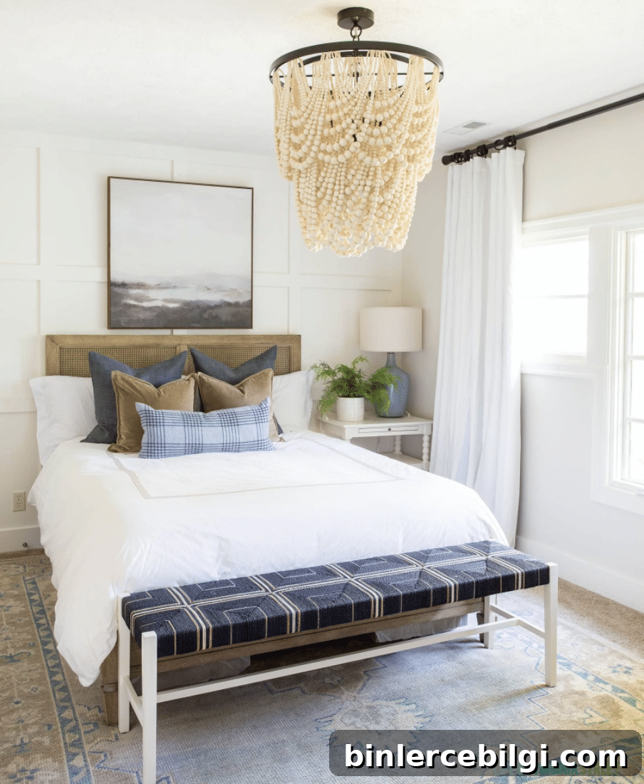 Bedroom Paint Colors That Create a Cozy, Relaxing Home (2026) 10 Swiss Coffee painted bedroom with white bedding