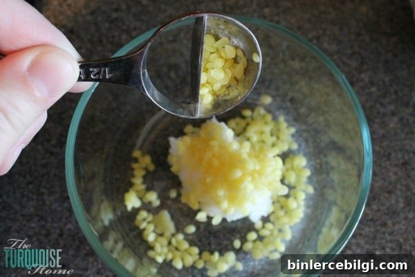 Using just three simple ingredients and a couple of minutes of your time, you can have homemade, all-natural lip balms to give away as gifts or keep for yourself. LOVE these as stocking stuffers or a gift anytime 'just because.' | TheTurquoiseHome.com
