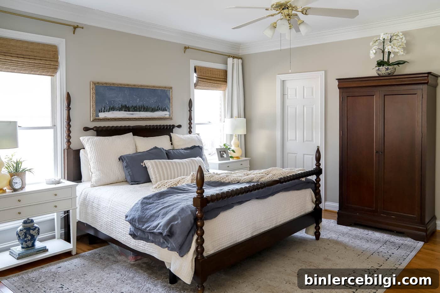 primary bedroom with ceiling fan