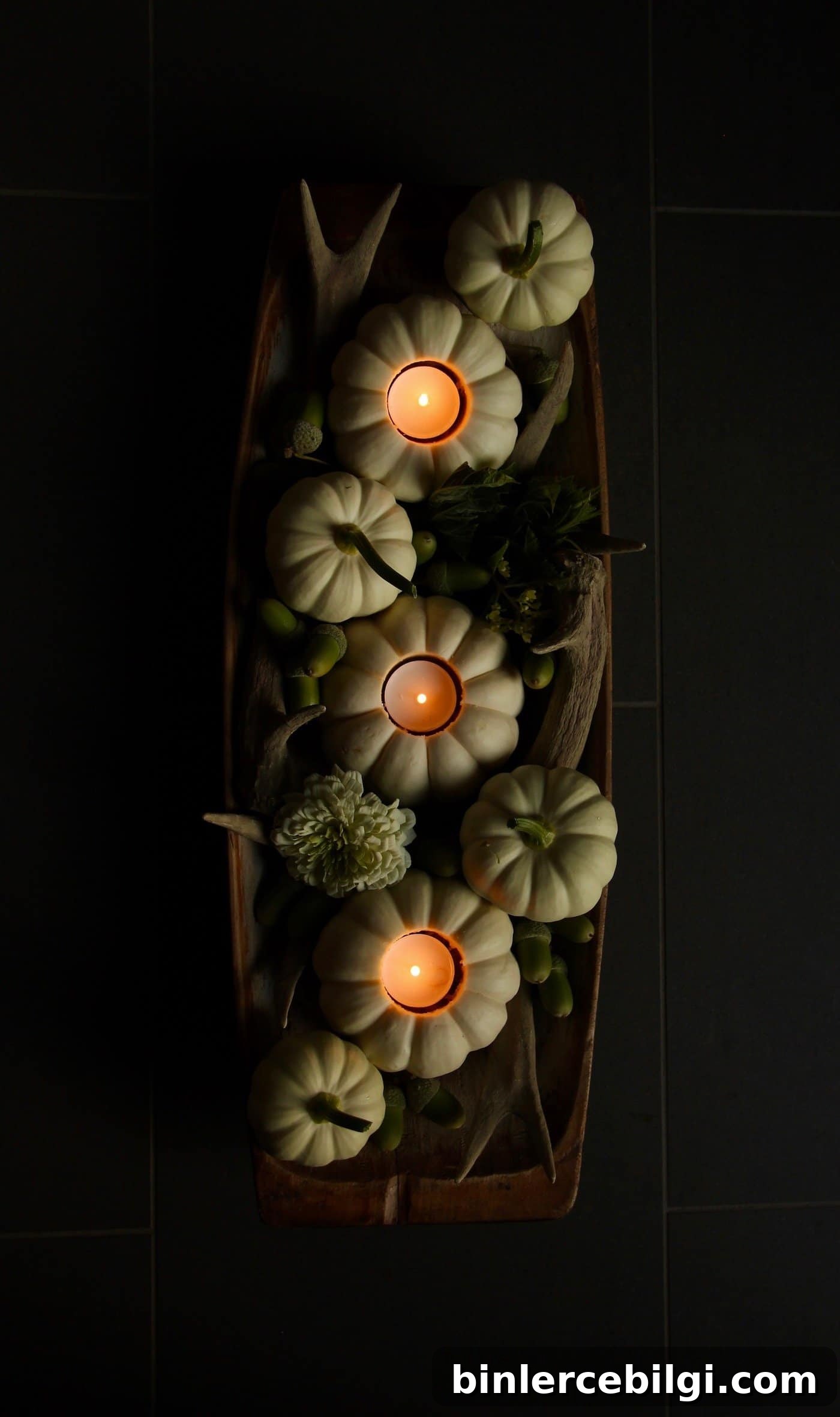 fall arrangement with pumpkins and tea lights