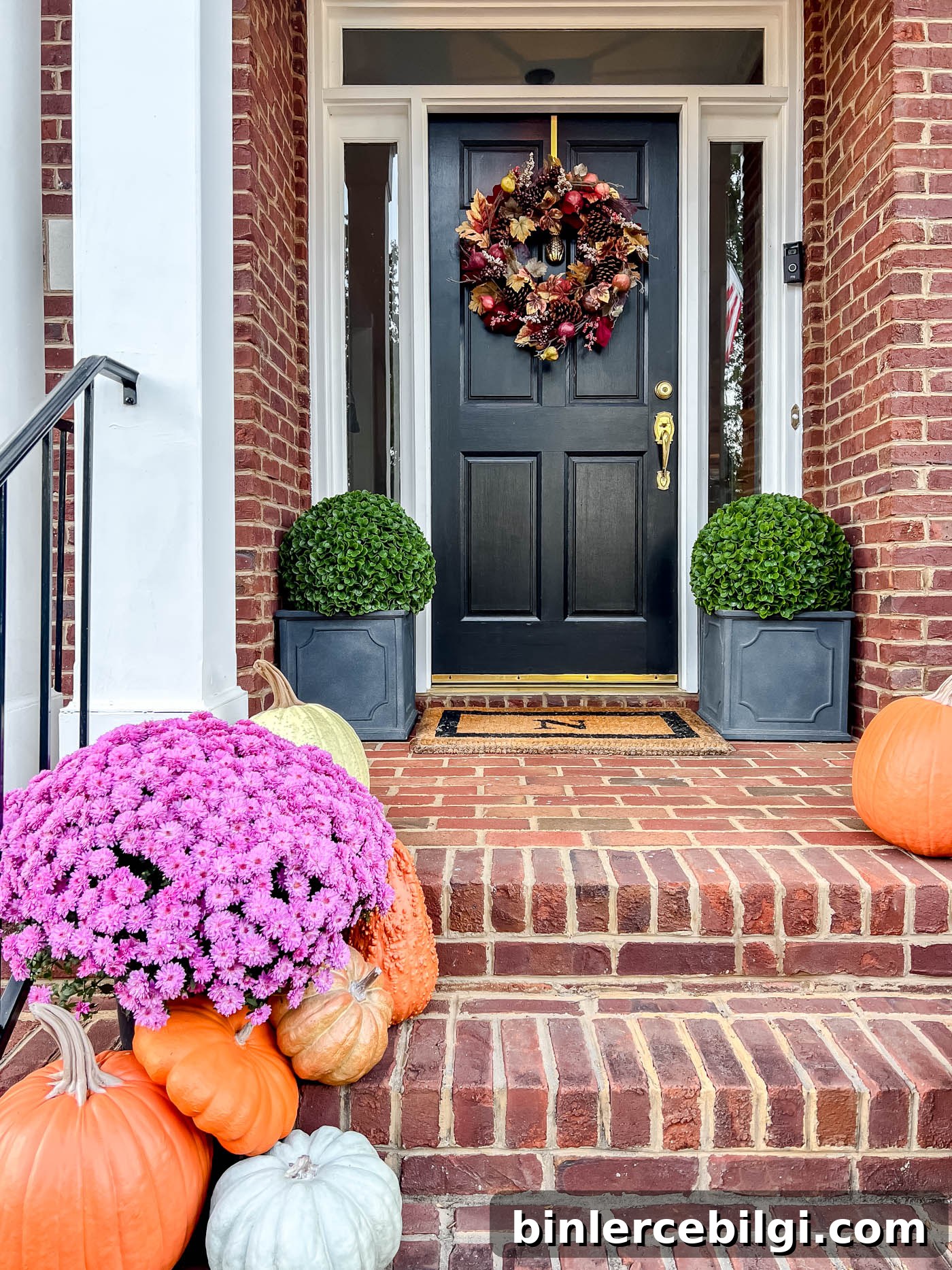 front porch with fake pumpkins that look real!