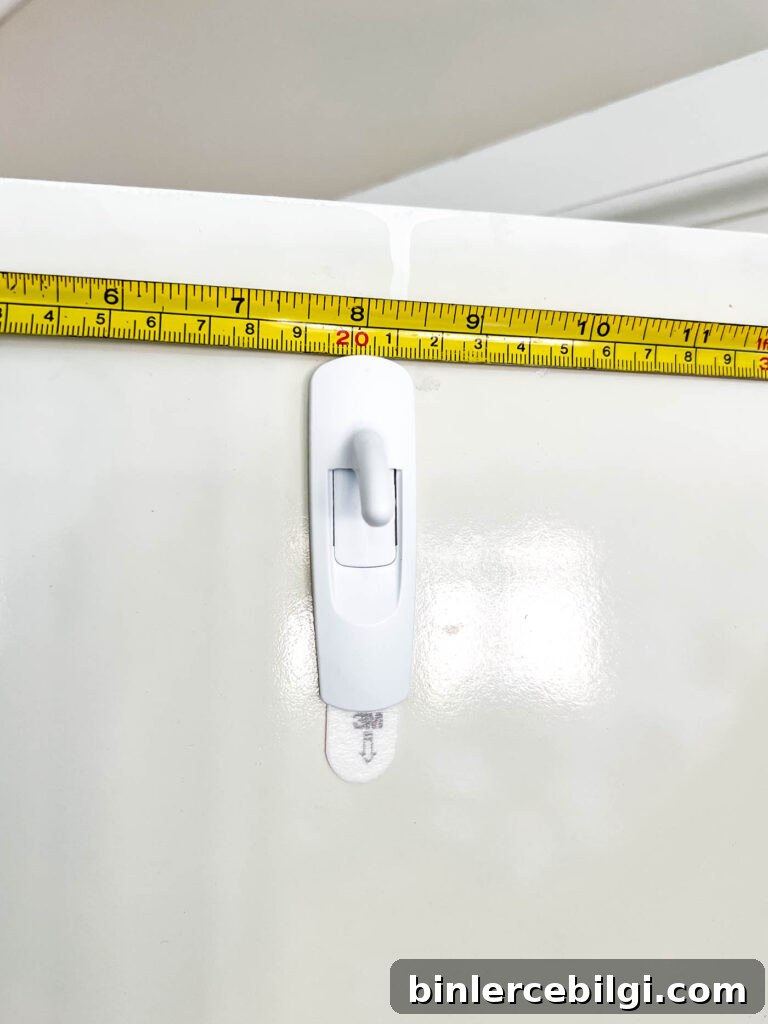 Command hook for cabinet wreath