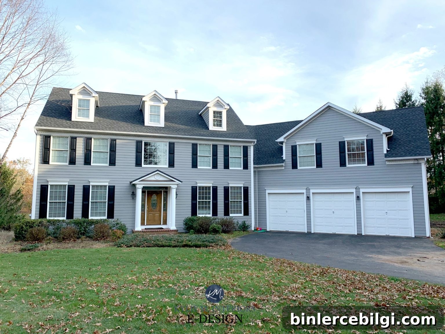 Sherwin-Williams Extra White SW 7006: Paint Color Guide 9 home exterior with gray body, black shutters, and Sherwin Williams Extra White trim