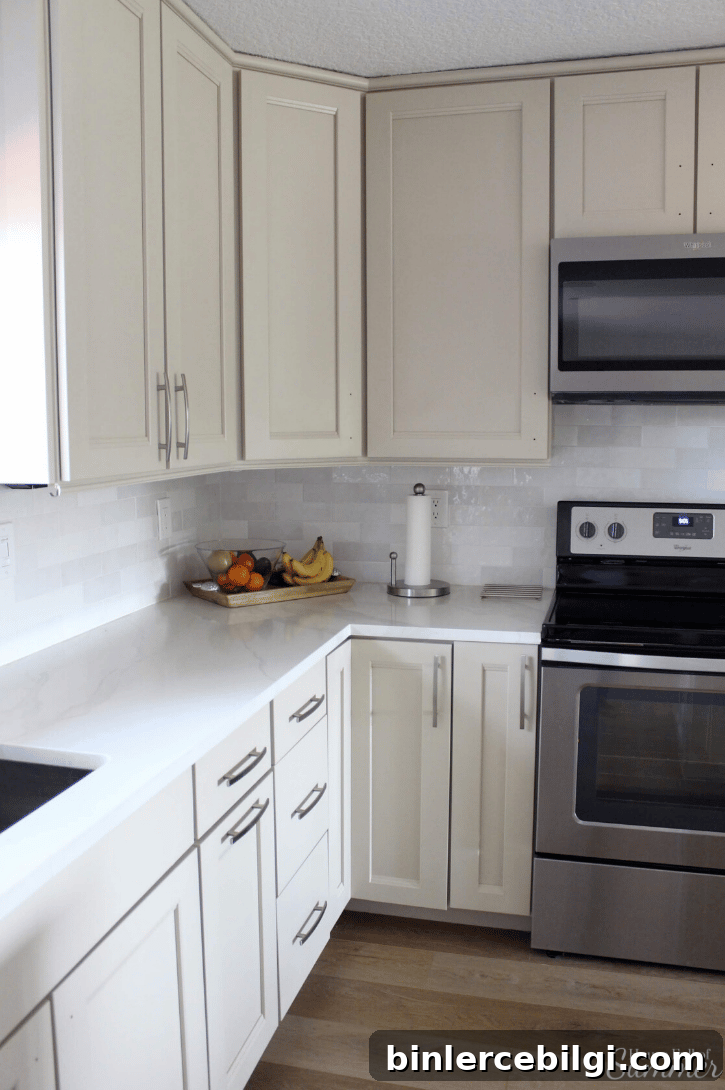 How to Use Benjamin Moore Balboa Mist Paint in Your Home 5 Benjamin Moore Balboa Mist featured on kitchen cabinets