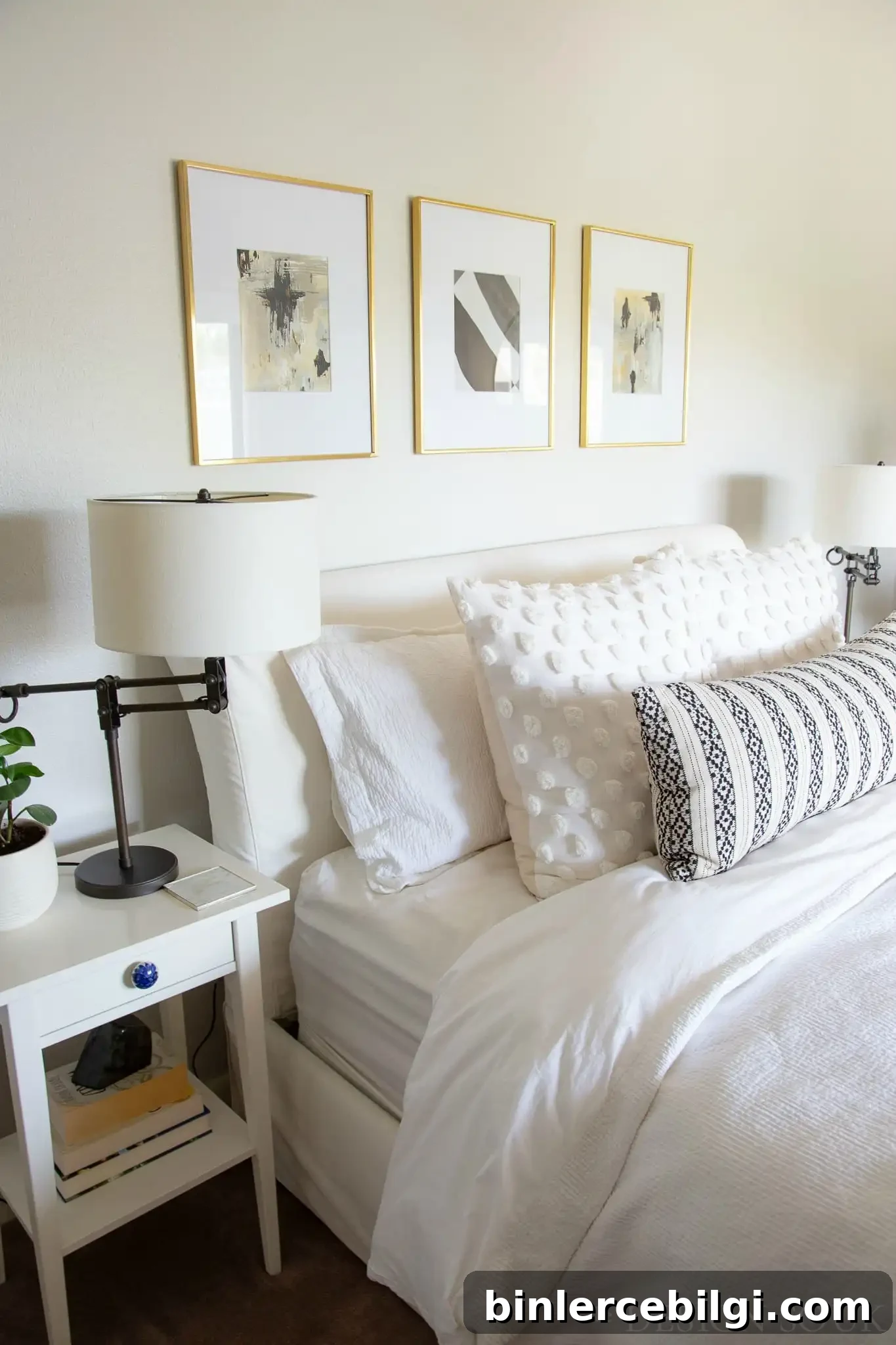 How to Use Benjamin Moore Balboa Mist Paint in Your Home 6 white linen bedding on an upholstered bed in a guest room