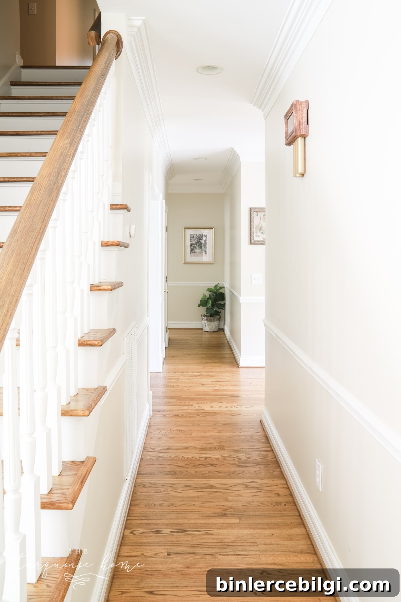 25 Timeless Interior Design Ideas to Last a Lifetime 4 long hallway with medium brown wood floors.