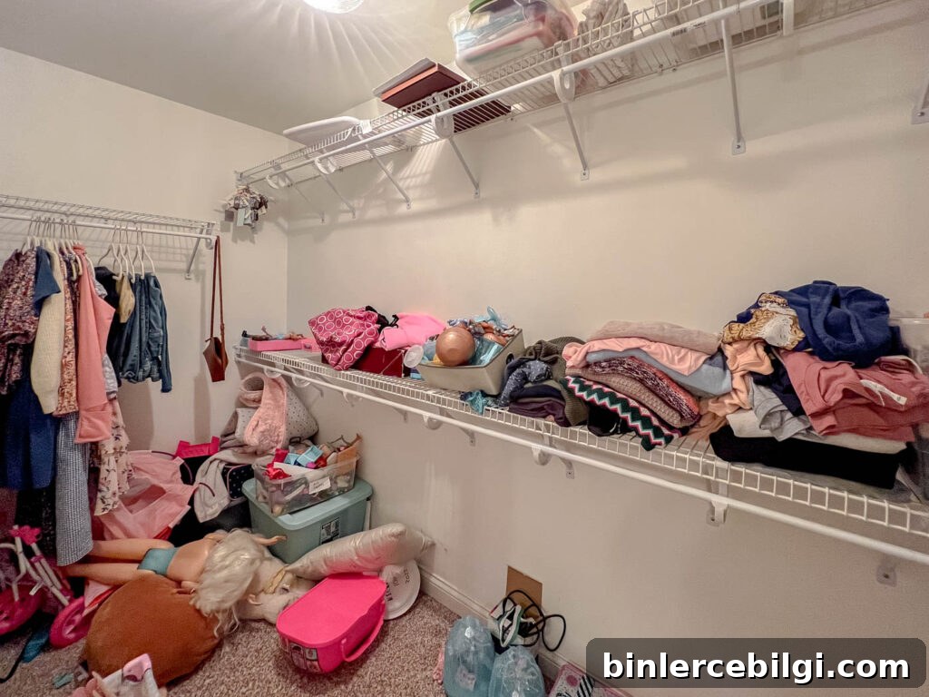 Underutilized wire shelves in walk-in closet
