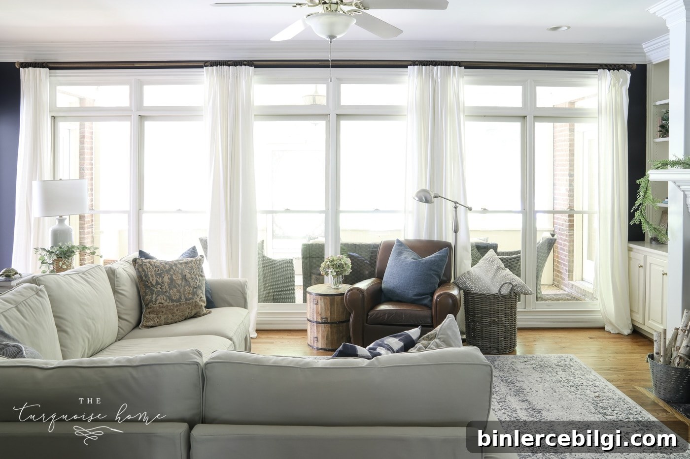 Wall of windows with long curtain rod