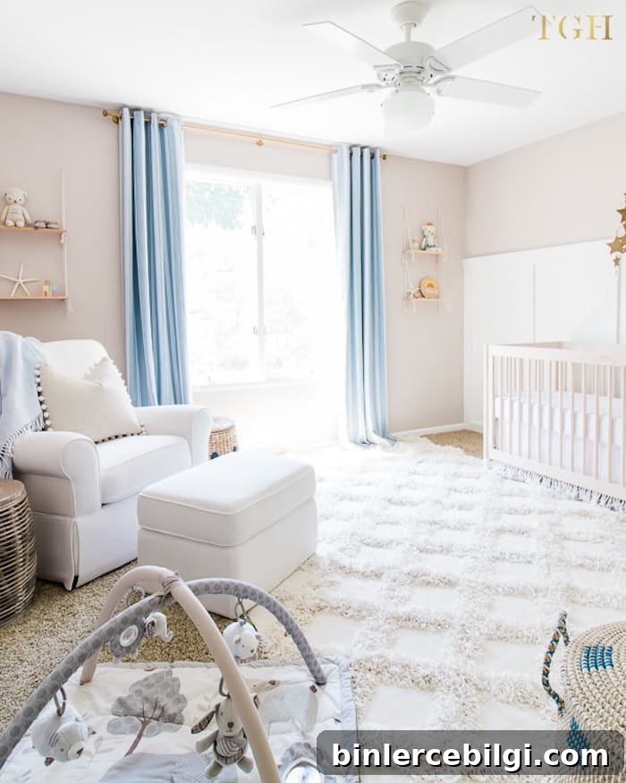 neutral beige nursery with blue curtains and comfortable white rug.