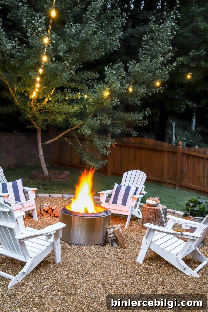 Solo stove in fire pit area with string lights.