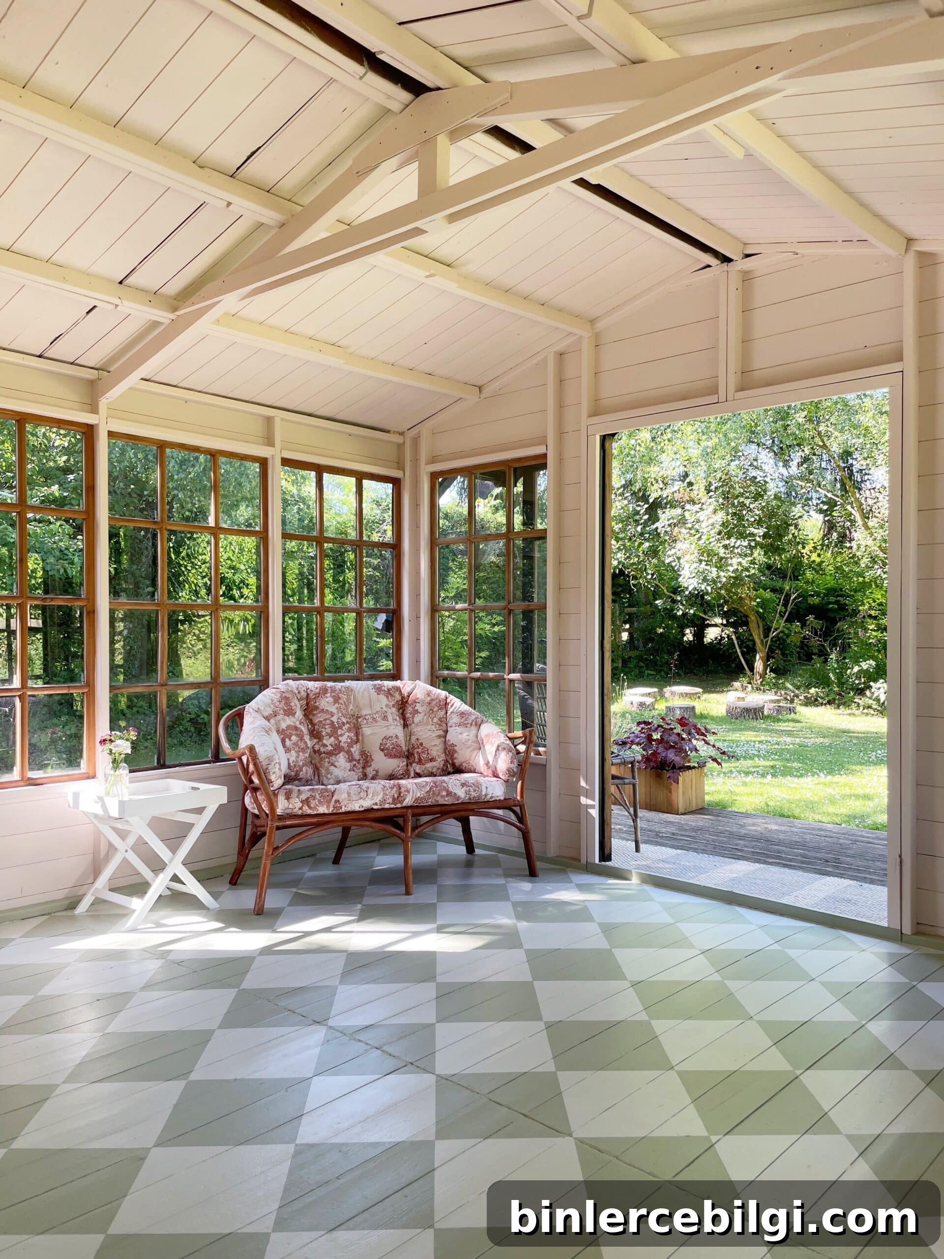 sunroom with painted checkered pattern on the wood floors