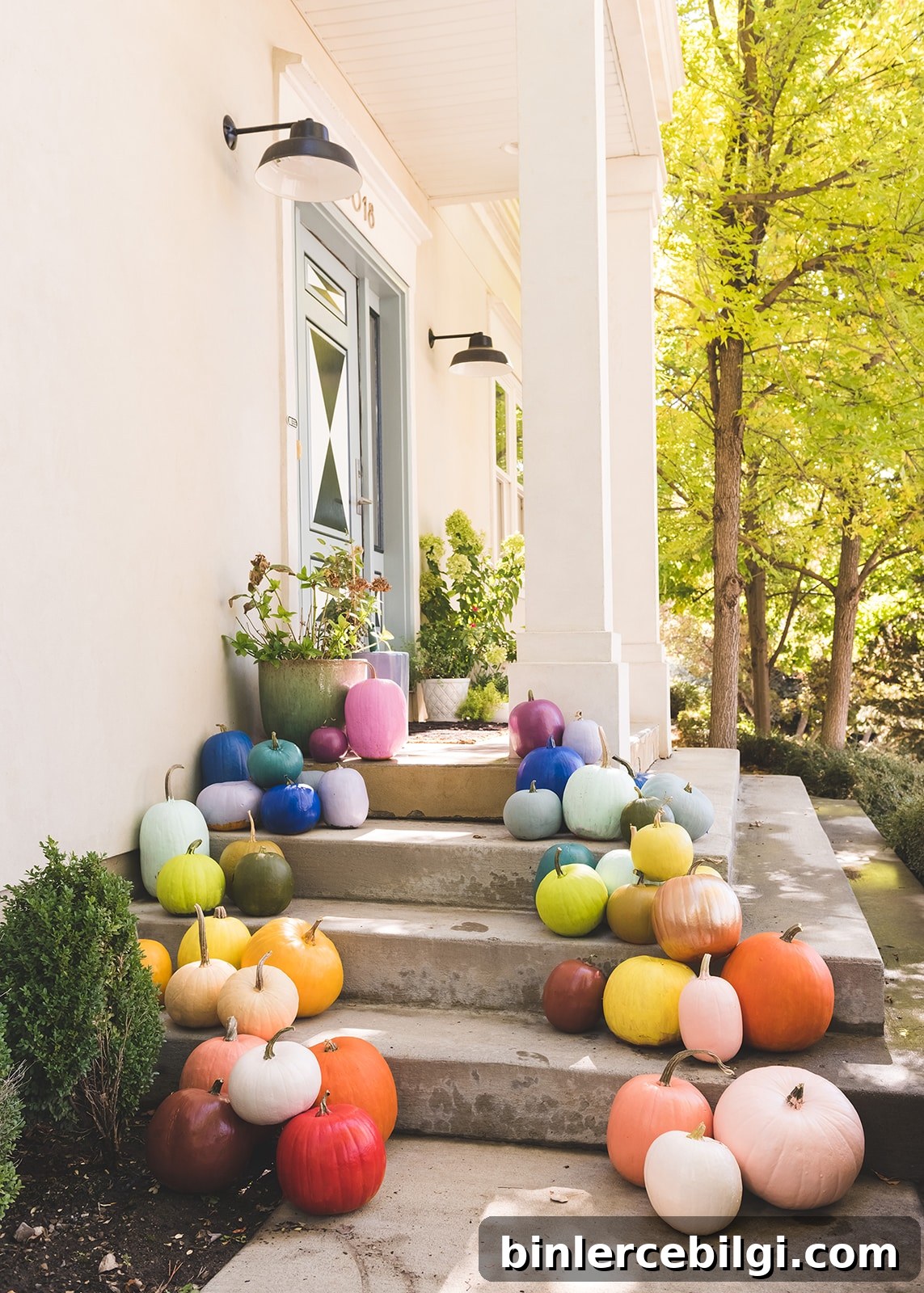 colorful modern pumpkins on front porch