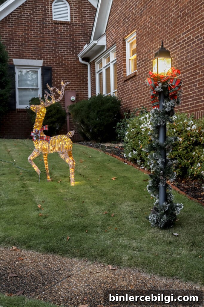 pre-lit buck holiday decor and decorated lamppost.