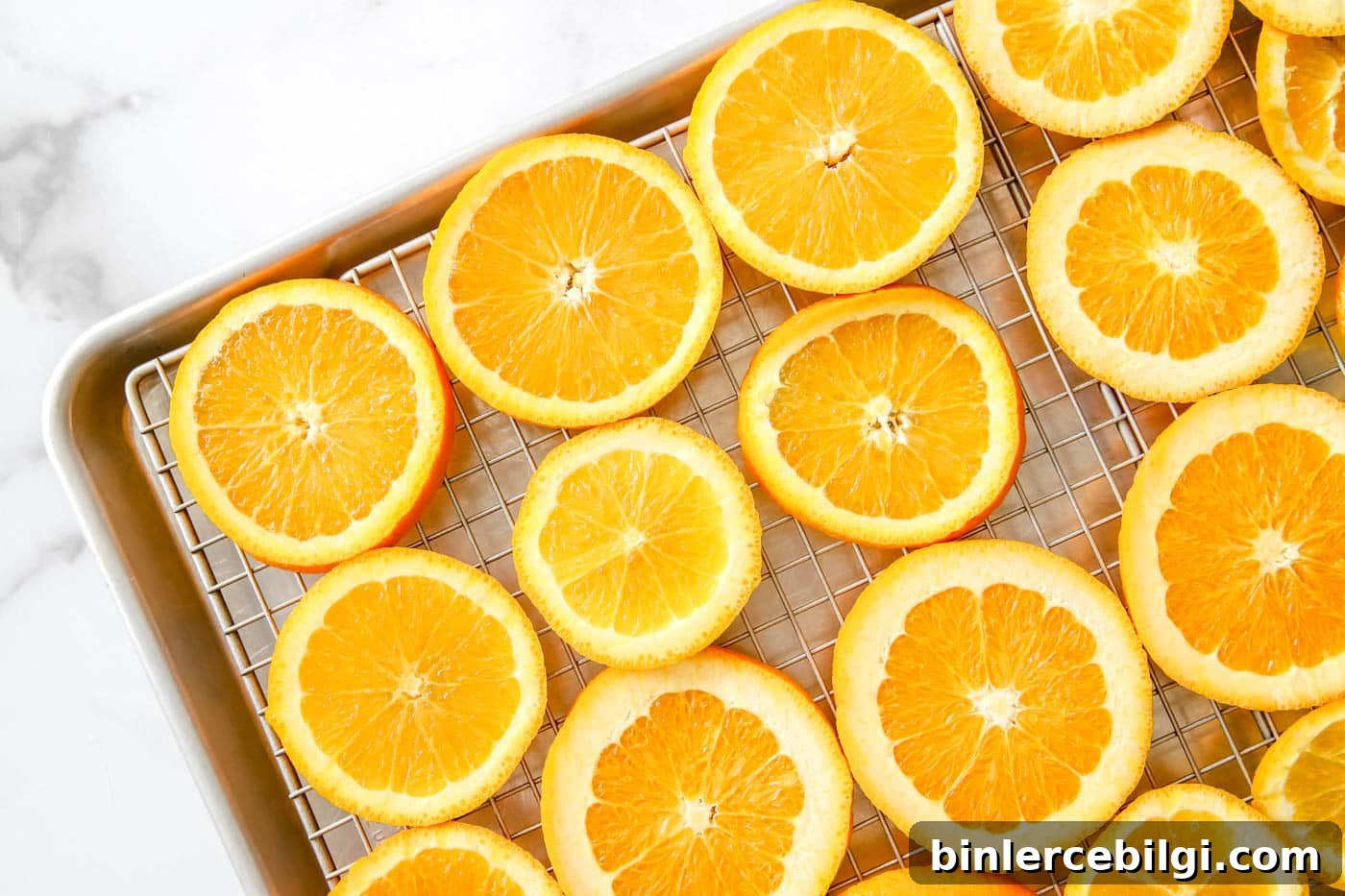 arrange oranges on a baking sheet.