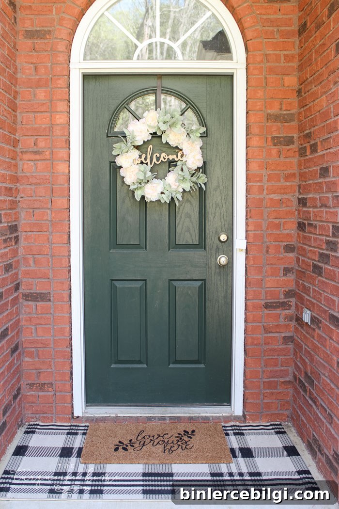 DIY "Love Grows Here" Doormat - easy to customize for cheap!