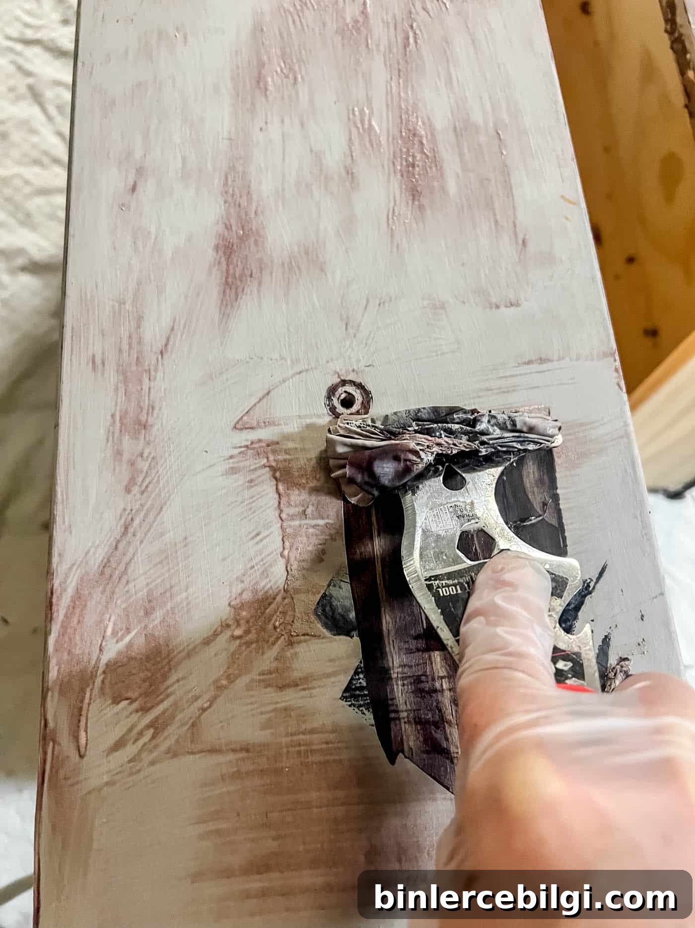 Refinish Wood Furniture: Step-by-Step DIY Guide 9 removing paint with a scraping tool.