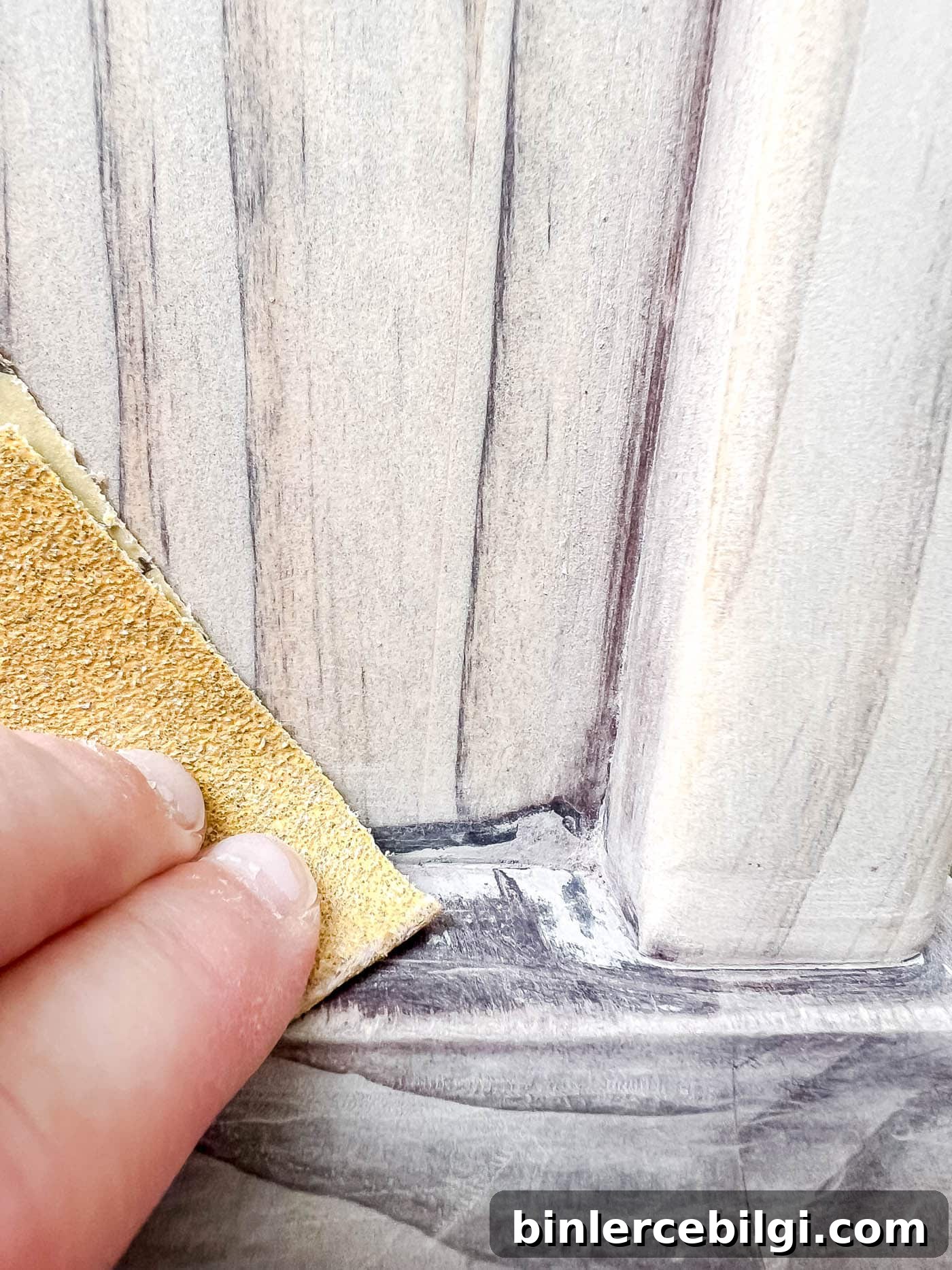 Refinish Wood Furniture: Step-by-Step DIY Guide 11 sanding the corners for refinishing wood furniture.