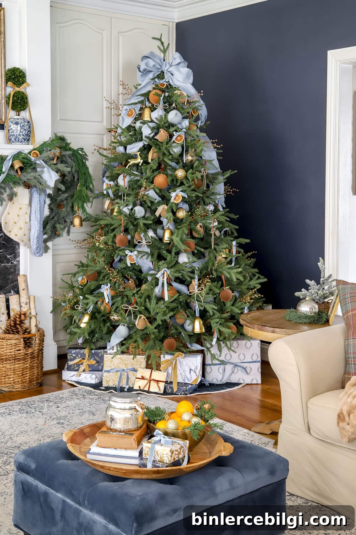 2025 Christmas Decor Trends to Watch 2 gold, brown and blue Christmas tree decor.