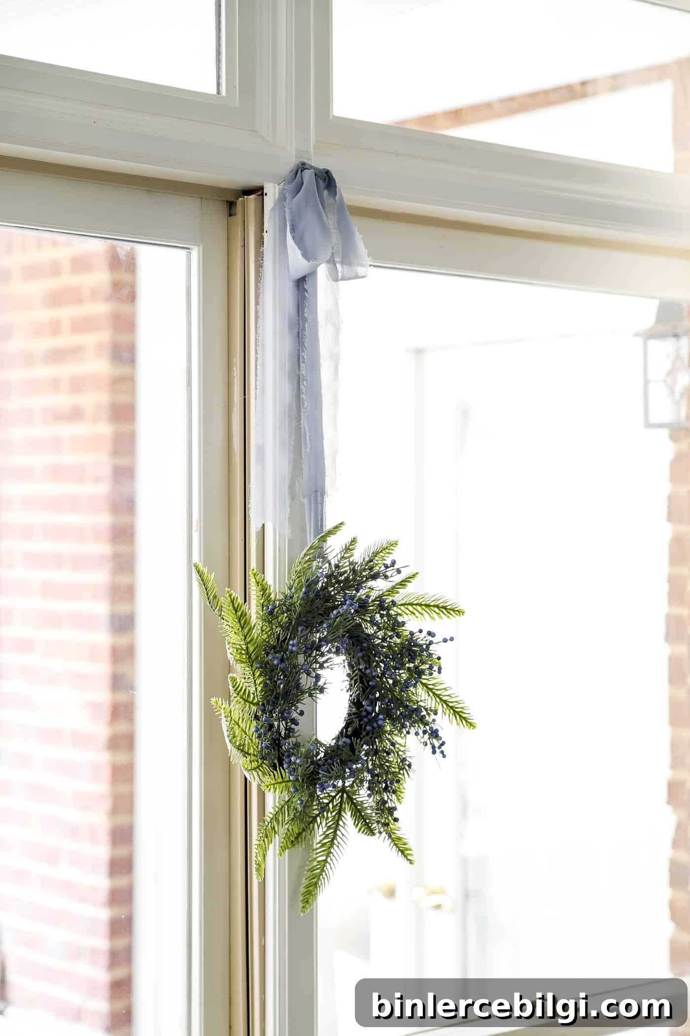 2025 Christmas Decor Trends to Watch 8 Christmas Wreath in Window