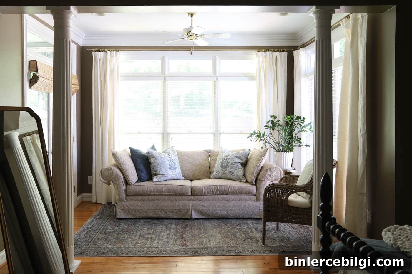 sitting room in bedroom with lots of natural light and Davenport Tan on the walls.