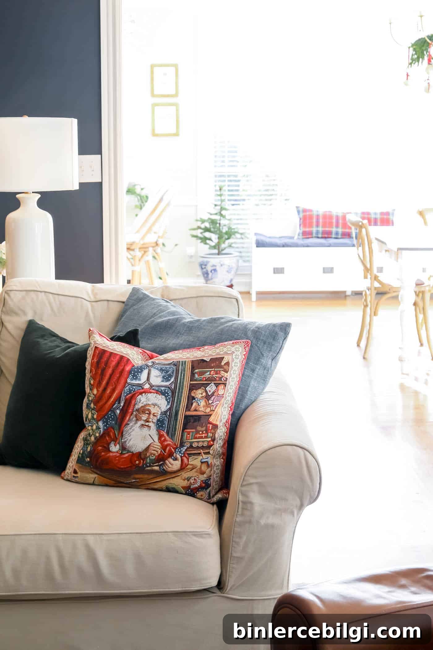 classic Santa throw pillow on sofa.