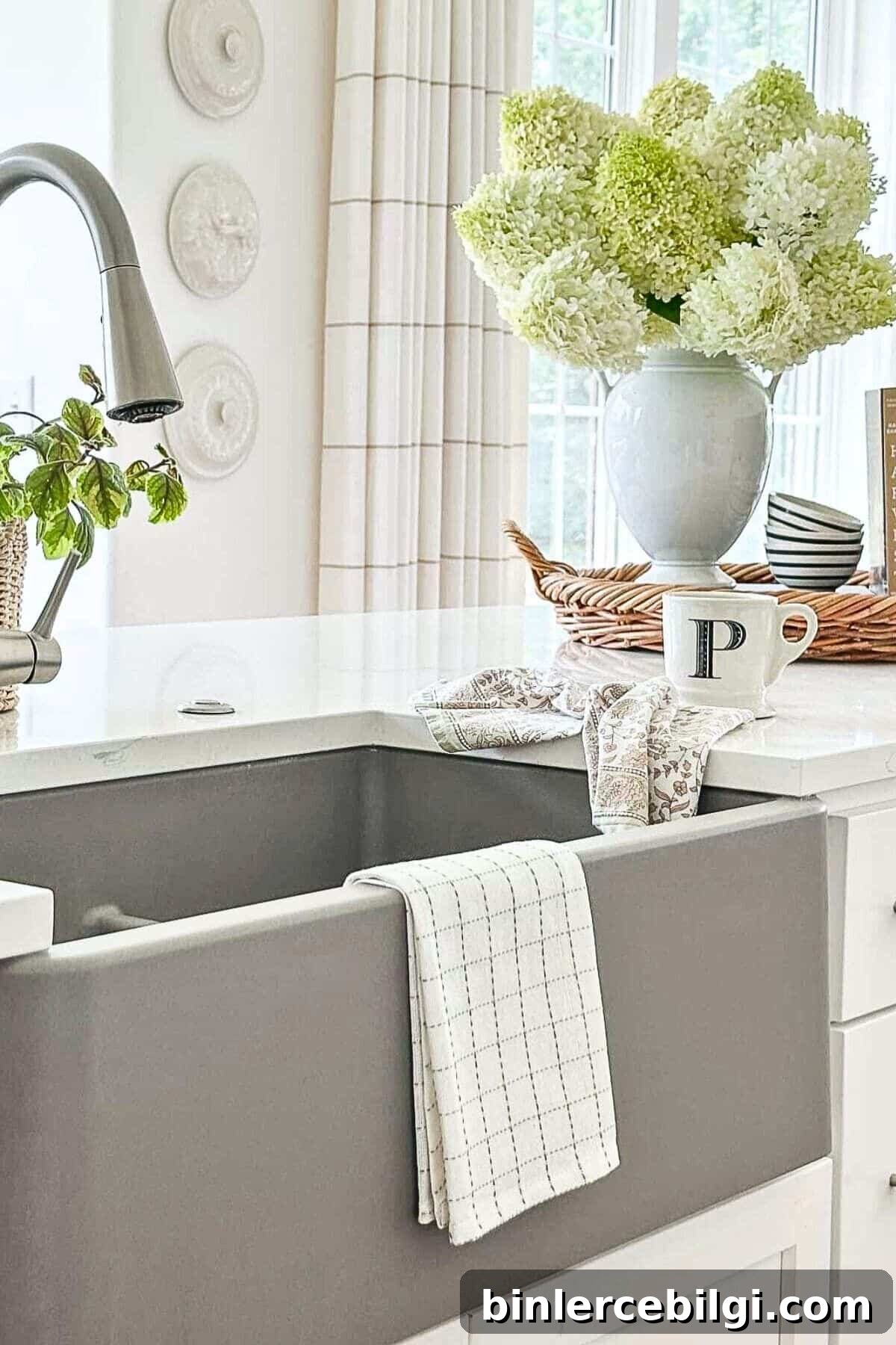 Kitchen sink vignette with hydrangeas and decor