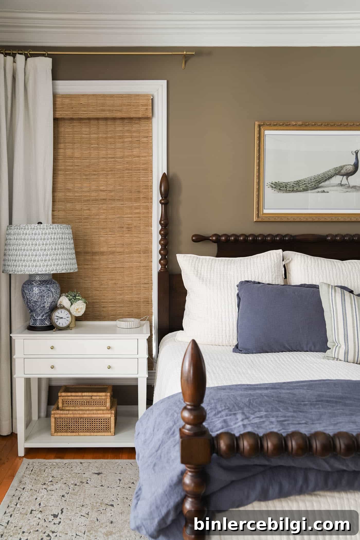 primary bedroom with white nightstands and chinoiserie lamps with pleated block print lamp shades.