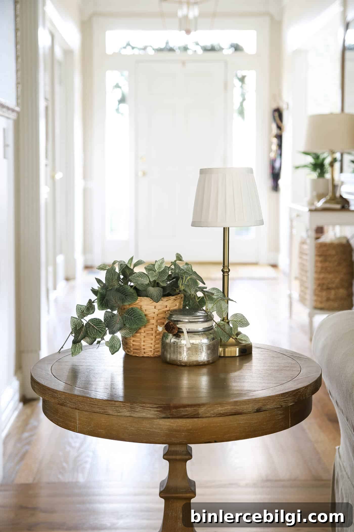 Post-Christmas Winter Decor Ideas to Cozy Up Your Home 8 Mini cordless lamp on an end table with greenery and a candle.