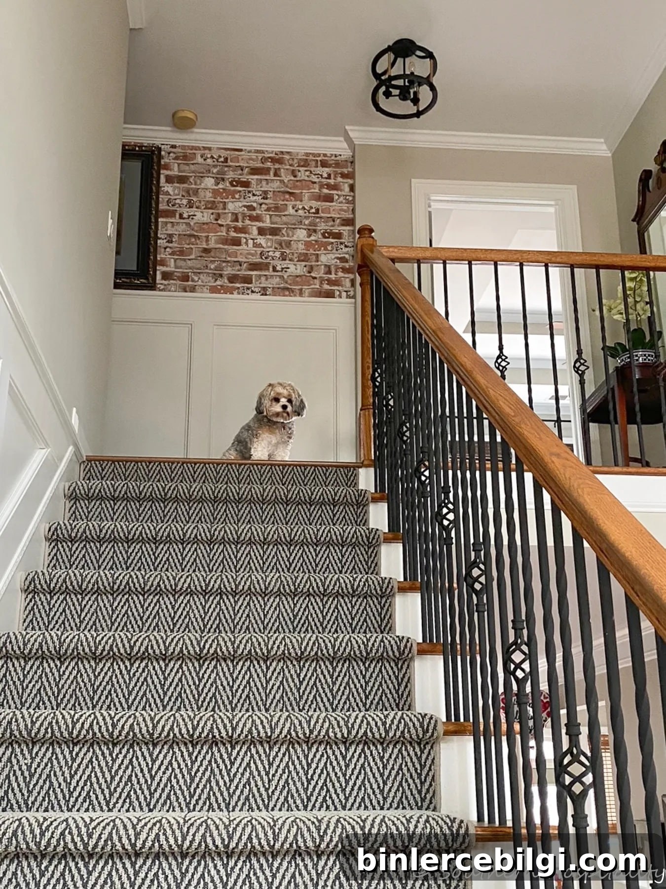 adding brick wallpaper in the stairwell.