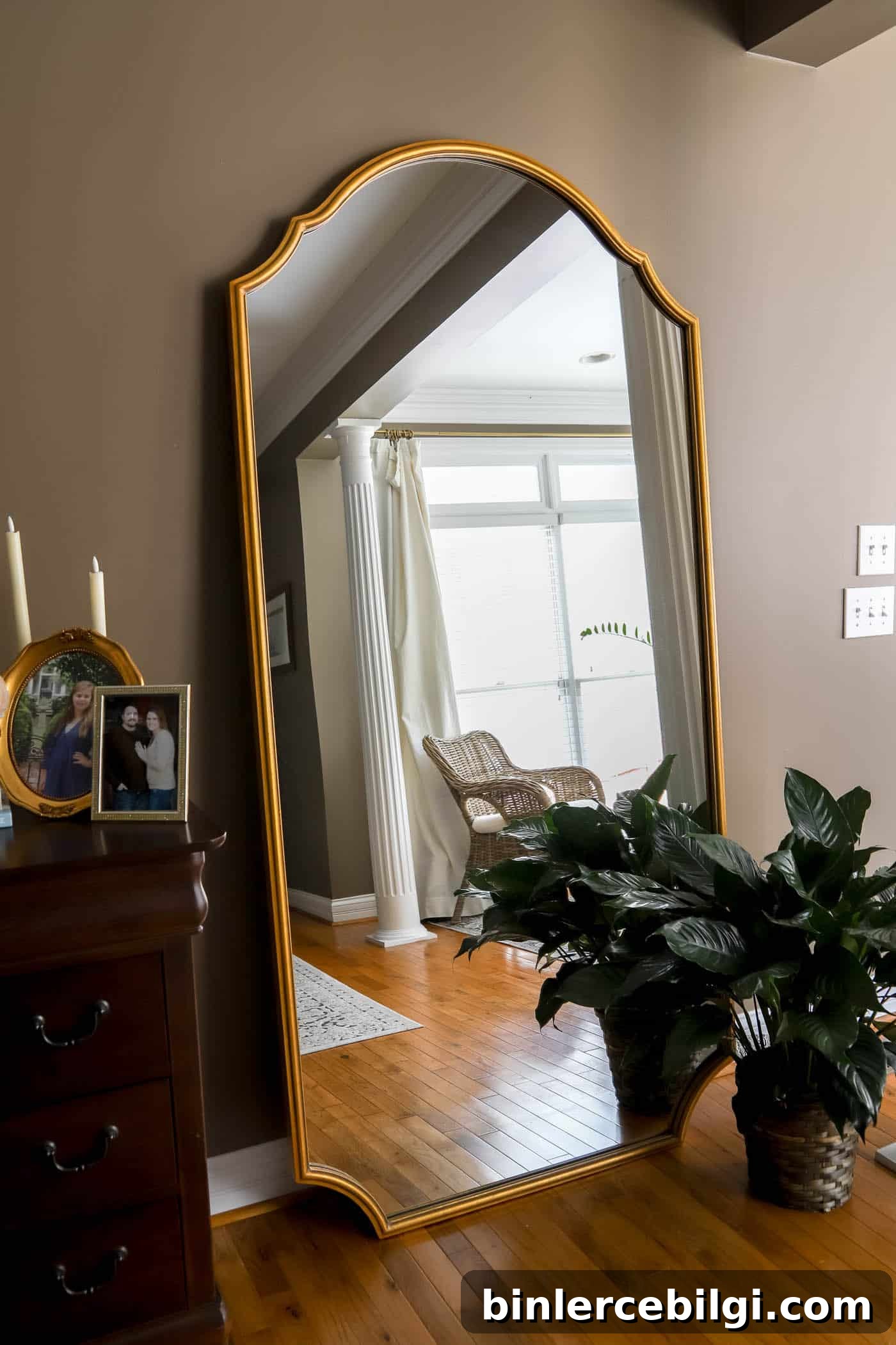 full-length mirror in the bedroom.