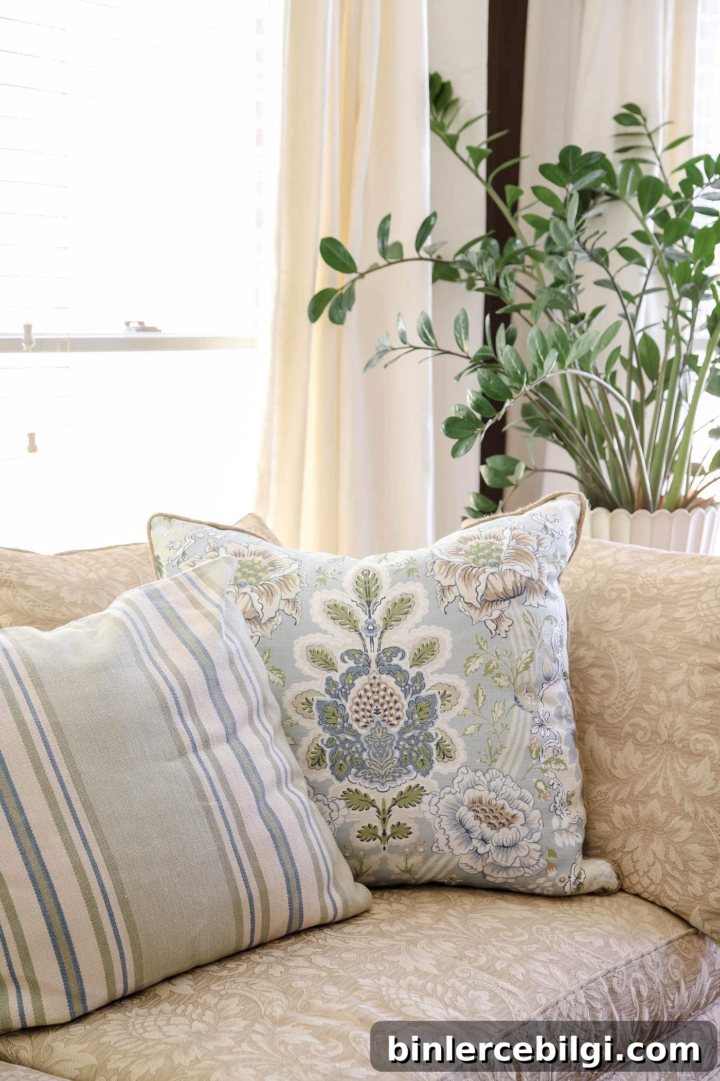 stripe and floral throw pillows for spring bedroom decor
